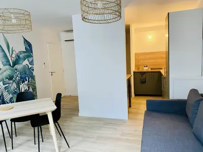 Coin salon dans l'établissement Suite 24 Appart'hôtel-L'Annexe-3 étoiles
