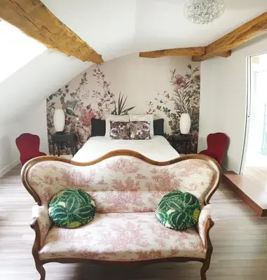 Coin salon dans l'établissement Maison Bélénos