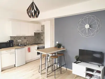 Cuisine ou kitchenette dans l'établissement Appartement calme en hypercentre