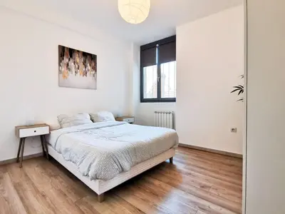 Un ou plusieurs lits dans un hébergement de l'établissement Appartement calme en hypercentre