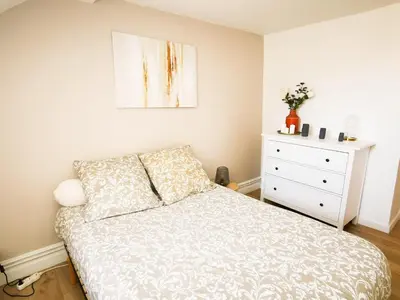 Un ou plusieurs lits dans un hébergement de l'établissement Appartement Cosy en Hypercentre - Le Petit Jules