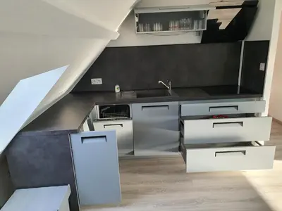 Cuisine ou kitchenette dans l'établissement La Marina