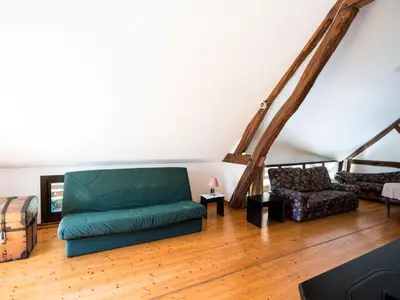 Coin salon dans l'établissement Holiday Home Alexandre by Interhome