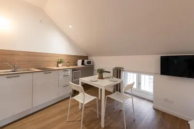 Cuisine ou kitchenette dans l'établissement Les Clés de La porte Saint-Nicolas - Parking - Centre