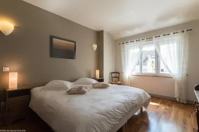 Un ou plusieurs lits dans un hébergement de l'établissement Les Meix sous le Château