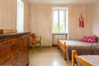 Un ou plusieurs lits dans un hébergement de l'établissement Gîte du Verger