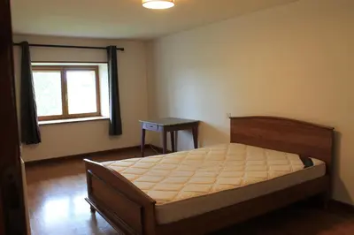 Un ou plusieurs lits dans un hébergement de l'établissement Maison champêtre au coeur de la campagne