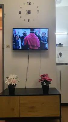 Télévision ou salle de divertissement dans l'établissement Studio de 12m² agréable calme proche CHU