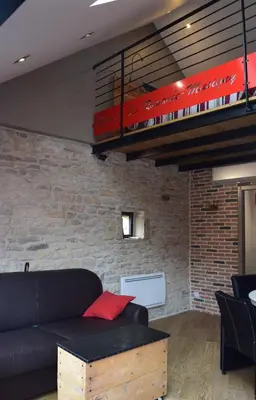 Coin salon dans l'établissement L'Aubergiste