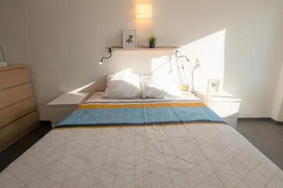 Un ou plusieurs lits dans un hébergement de l'établissement CABANA & Duplex - Cluny à 20 minutes