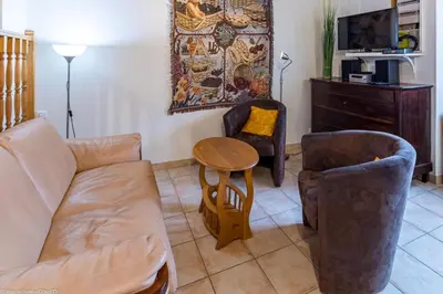 Télévision ou salle de divertissement dans l'établissement La Maisonnette