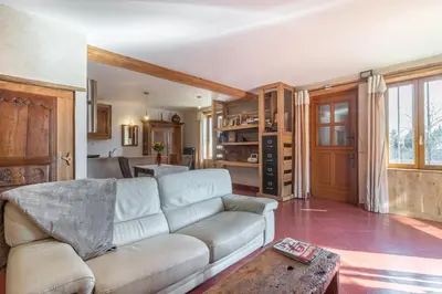 Coin salon dans l'établissement Petite Maison de Jeanne - Corps de ferme rénové