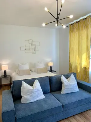Coin salon dans l'établissement DIJON CENTRE VILLE : SUPER APPARTEMENT NEUF