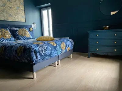 Un ou plusieurs lits dans un hébergement de l'établissement Appartement cosy en centre ville avec SPA et jardin