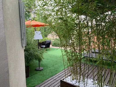 Jardin de l'établissement Appartement cosy en centre ville avec SPA et jardin