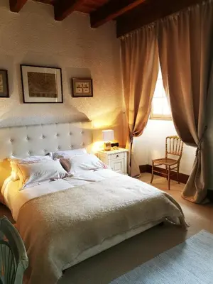 Un ou plusieurs lits dans un hébergement de l'établissement maison de campagne
