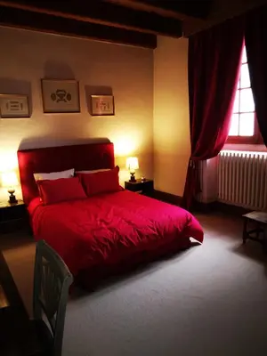 Un ou plusieurs lits dans un hébergement de l'établissement maison de campagne