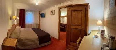 Un ou plusieurs lits dans un hébergement de l'établissement Hotel de Bourgogne