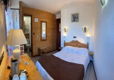 Un ou plusieurs lits dans un hébergement de l'établissement Hotel de Bourgogne