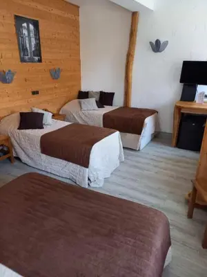 Un ou plusieurs lits dans un hébergement de l'établissement Hotel de Bourgogne