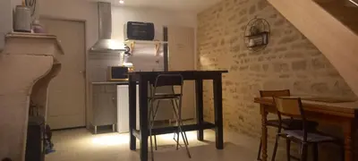 Cuisine ou kitchenette dans l'établissement Le cottage du village
