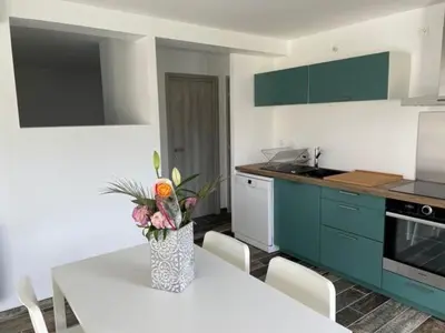 Cuisine ou kitchenette dans l'établissement Gîte calme au bord de l'Ouche.