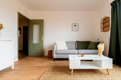 Coin salon dans l'établissement Le Jouvence Cozy - Confort - Zen - Parking gratuit