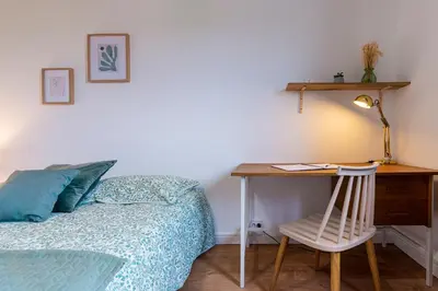 Un ou plusieurs lits dans un hébergement de l'établissement Le Jouvence Cozy - Confort - Zen - Parking gratuit