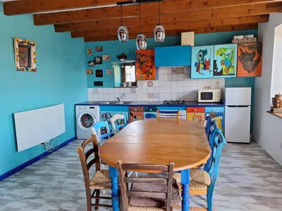 Cuisine ou kitchenette dans l'établissement Gite Fée Grenouille