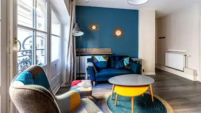 Coin salon dans l'établissement L'Escapade Urbaine - Cosy et central