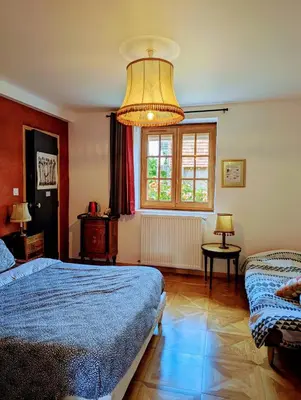 Un ou plusieurs lits dans un hébergement de l'établissement Maison d'hôtes Trip'n Touille