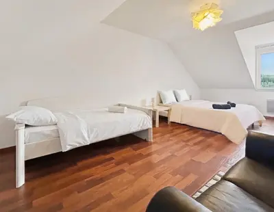 Un ou plusieurs lits dans un hébergement de l'établissement Belle Maison au Calme à Saint Martin du Tartre