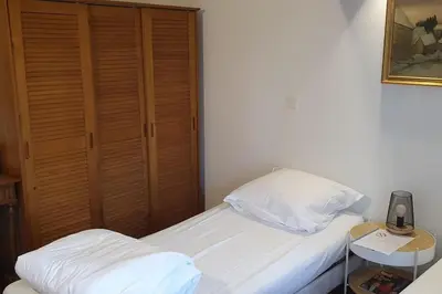 Un ou plusieurs lits dans un hébergement de l'établissement MAISON SYLVAIN