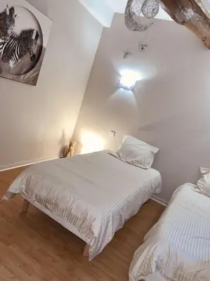 Un ou plusieurs lits dans un hébergement de l'établissement Maison entière aux portes du canal de Bourgogne