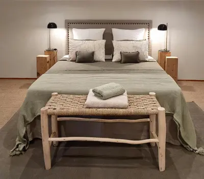 Un ou plusieurs lits dans un hébergement de l'établissement B&B à la campagne