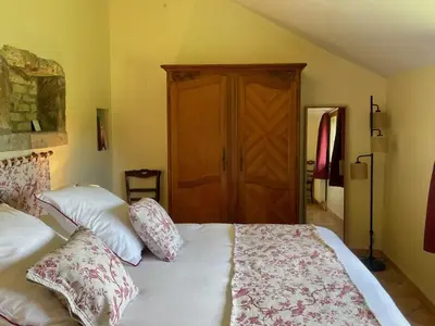 Un ou plusieurs lits dans un hébergement de l'établissement Maison Montcharmont