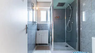 Salle de bains dans l'établissement Le Wilson appart