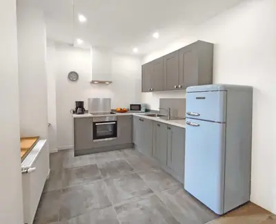 Cuisine ou kitchenette dans l'établissement Studio - Pied à Terre Saulieu
