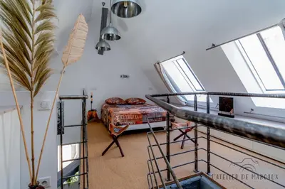 Un ou plusieurs lits dans un hébergement de l'établissement Superbe Loft, Chalon sur Saône