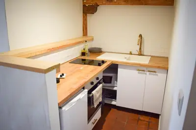 Cuisine ou kitchenette dans l'établissement Studio au Moulin 
