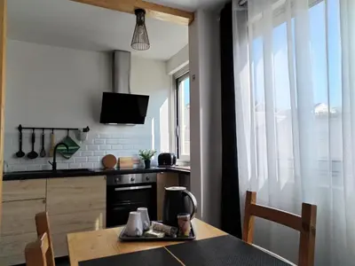 Cuisine ou kitchenette dans l'établissement Appartement centre ville avec parking privatif
