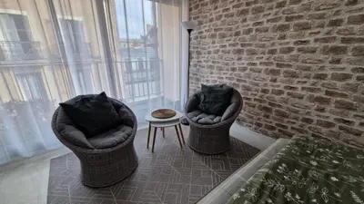 Coin salon dans l'établissement Appartement centre ville avec parking privatif