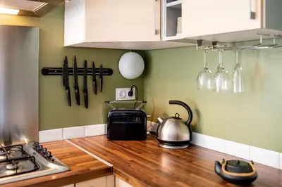 Cuisine ou kitchenette dans l'établissement Passage en Paradis