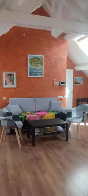 Coin salon dans l'établissement Bienvenue au Faré Hibiscus