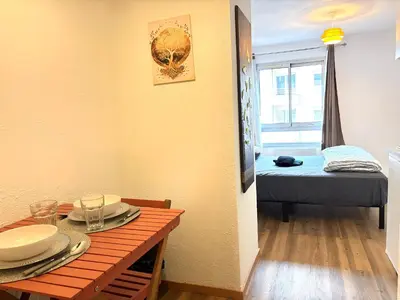 Un ou plusieurs lits dans un hébergement de l'établissement Les Logis de Paray Appartement 202