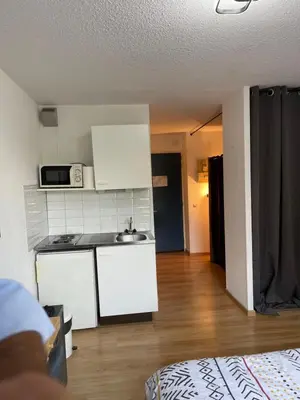 Cuisine ou kitchenette dans l'établissement Les Logis de Paray Appartement 202