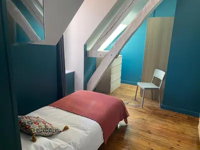 Un ou plusieurs lits dans un hébergement de l'établissement Studio 2 pers ou Appartement 4-7 pers Quartier Cathédrale