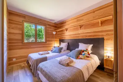 Un ou plusieurs lits dans un hébergement de l'établissement Les Lodges du Morvan