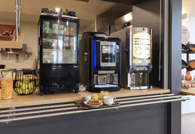 Cuisine ou kitchenette dans l'établissement B&B HOTEL Paray-le-Monial