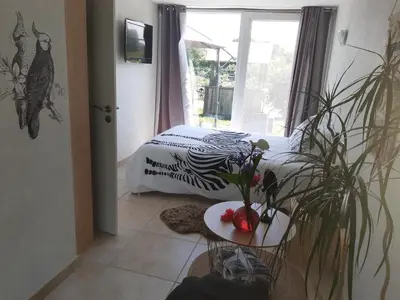 Un ou plusieurs lits dans un hébergement de l'établissement Soirée romantique avec Bain Nordique sur Domaine Equestre, Studio Tout Confort